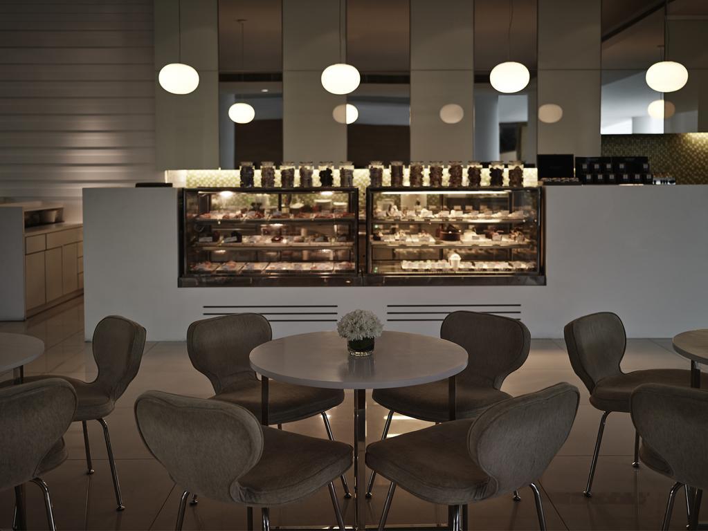 โรงแรมพูลแมน กูชิง ภายนอก รูปภาพ 3D rendering of a restaurant