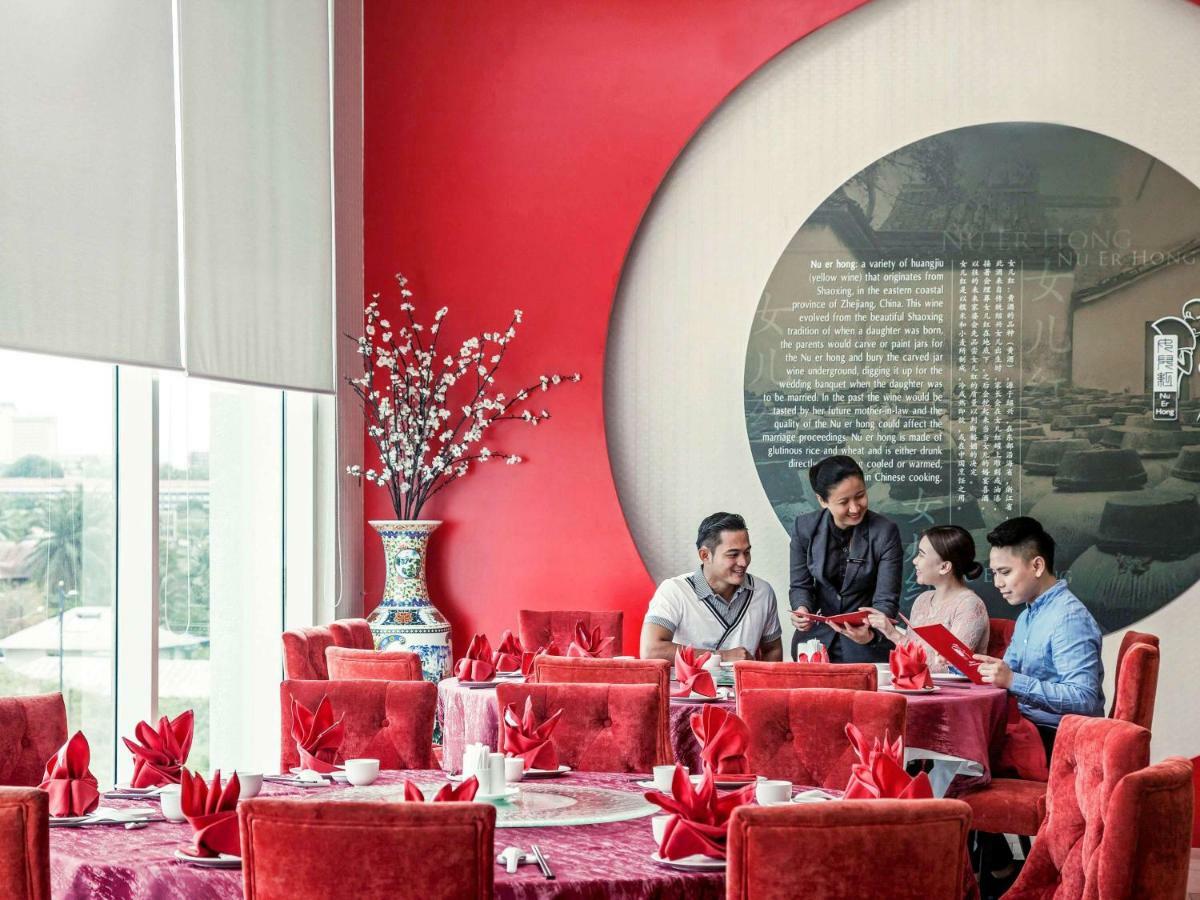 โรงแรมพูลแมน กูชิง ภายนอก รูปภาพ The restaurant